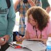 Jane Couch signs autographs for fans on the Museum Grounds