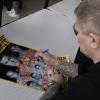 Ricky Hatton signs a fight poster for a fan on the Museum Grounds.